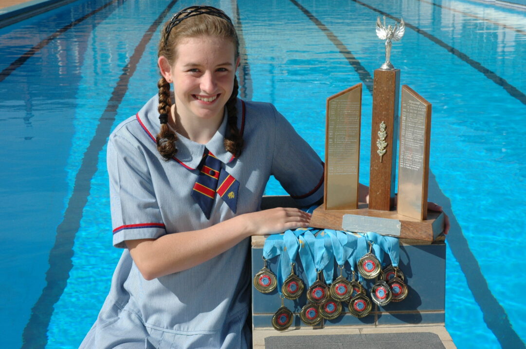 Downlands Year 10 student, Kady Ibell with some of her many swimming medals.
