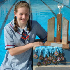 Downlands Year 10 student, Kady Ibell with some of her many swimming medals.