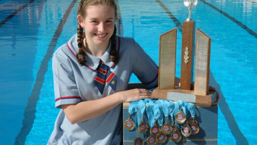 Downlands Year 10 student, Kady Ibell with some of her many swimming medals.