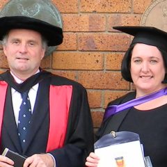 USQ Law graduate Mary Ann Armstrong is congratulated by Law School Head, Professor Mike Robertson.