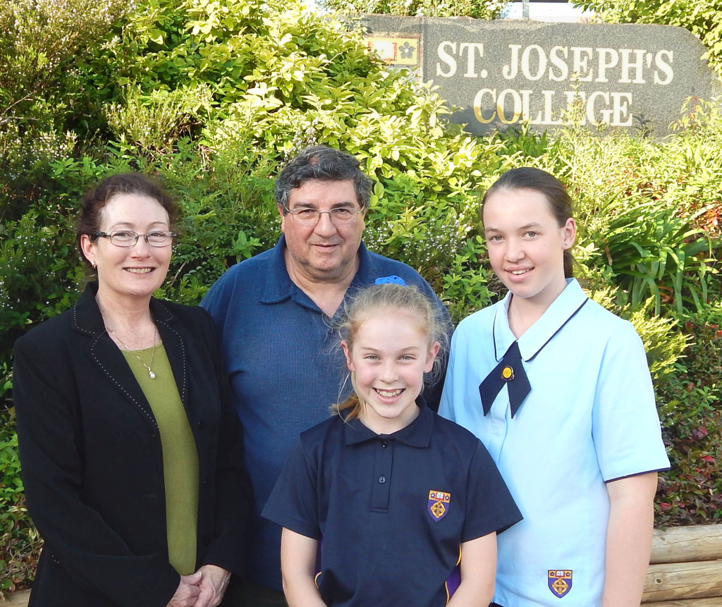 Teachers Madel;eine Minns and Gerard Saide with Courtney Dukes andAbbey-Rose Condon